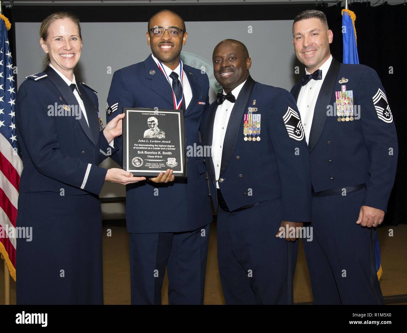 (Second from left) U.S. Air Force Senior Airman Ronrico Smith is ...