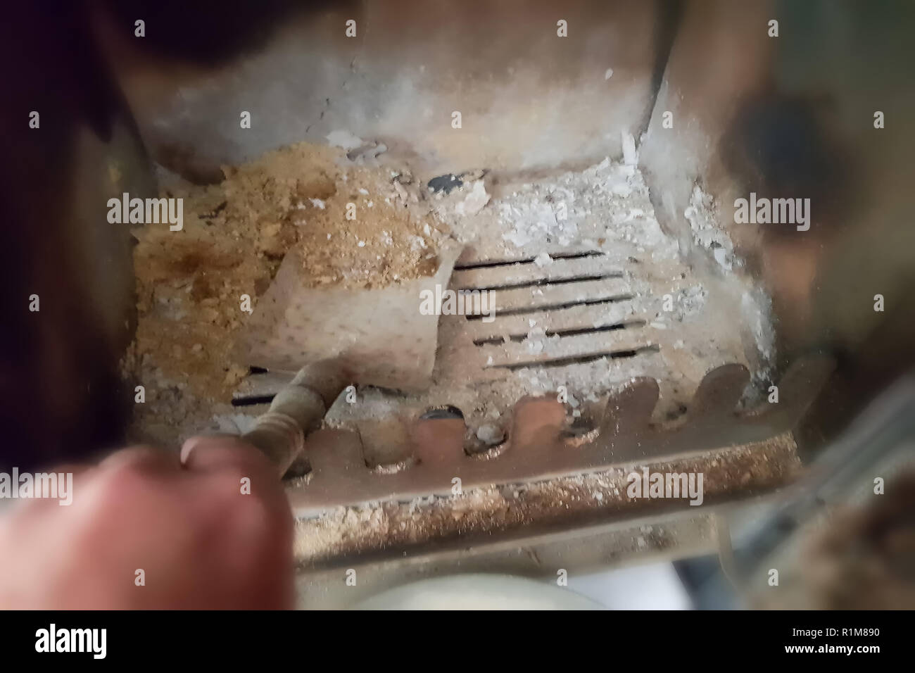 Clean The Fireplace Ashes And Charred Pieces Of Wood Discard
