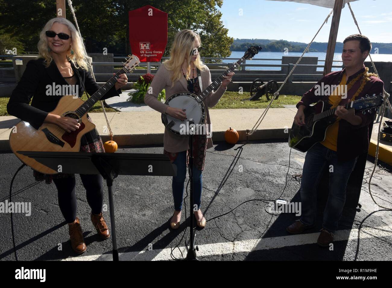 Recording Artist Delnora Reed Acuff (Left), Banjoist Brandy Miller and Guitarist Joe Dean perform music of the period of the 1940s during the 75th Anniversary Commemoration of Dale Hollow Dam and Reservoir Oct. 19, 2018. Stock Photo