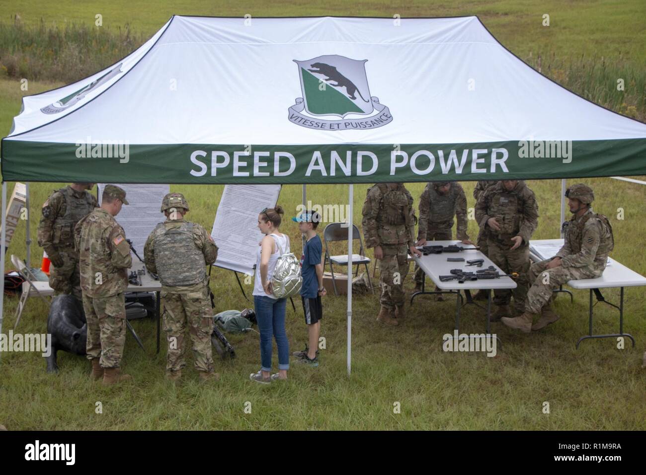 2nd Battalion, 69th Armored Regiment, 2nd Armored Brigade Combat Team, 3rd Infantry Division displays weapons during the 2-69 AR “Family Day,” at Fort Stewart, Ga., Oct. 20. The event allowed families to see tanks firing and handle weaponry in a safe, controlled setting. Stock Photo