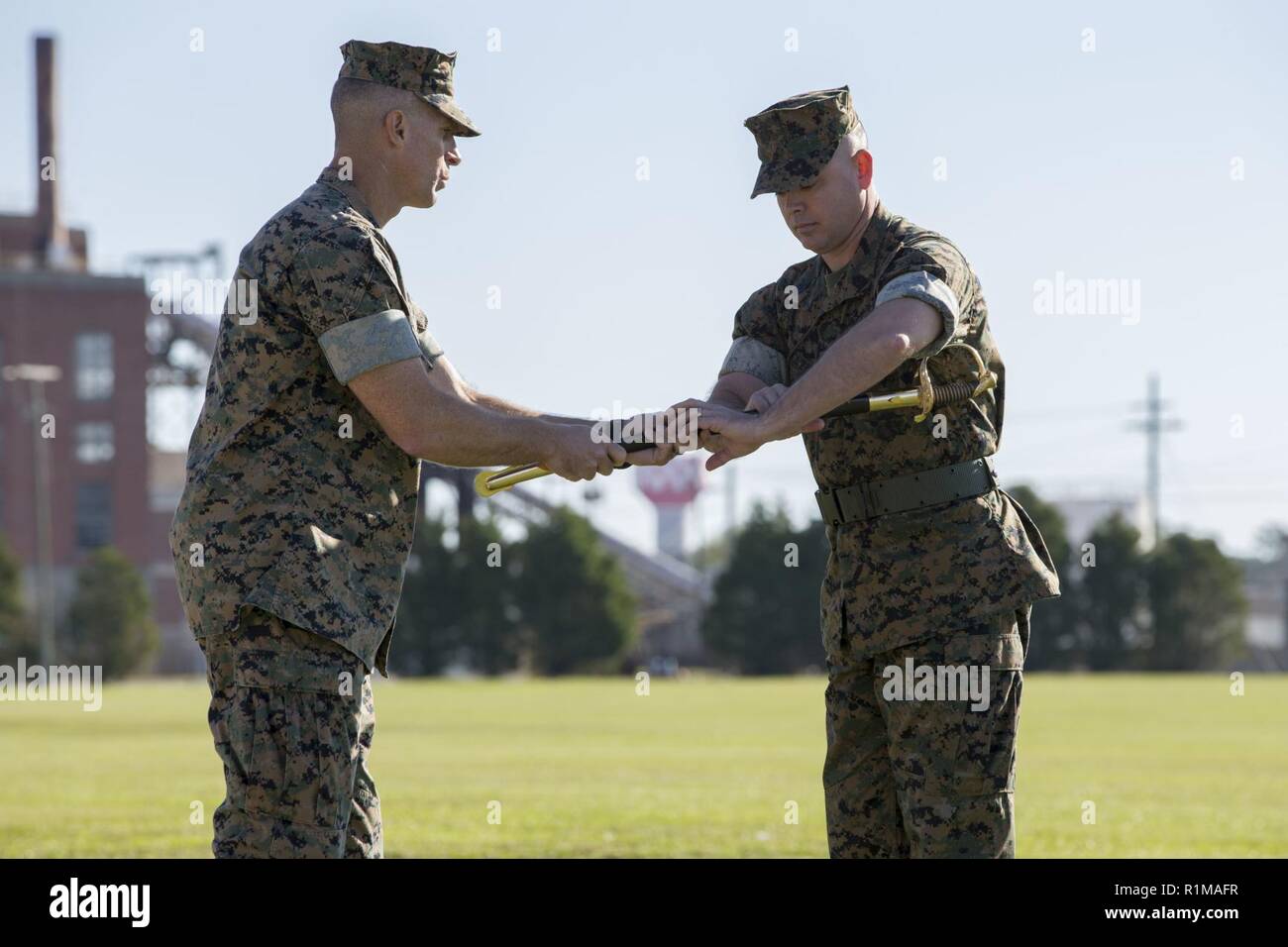 U.S. Marine Corps Col. Scott E. Conway, left, commanding officer, Headquarters and Support
