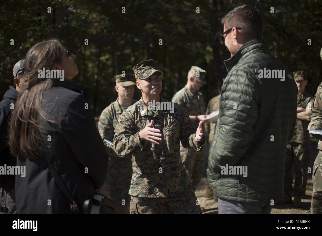 U.S. Marine with Marine Corps Information Operations Center (MCIOC), discusses operations