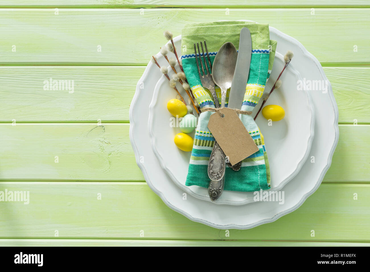 Easter table setting on wood background Stock Photo