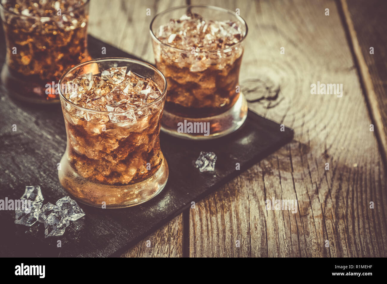 Rum and cola cocktail in glasses Stock Photo Alamy