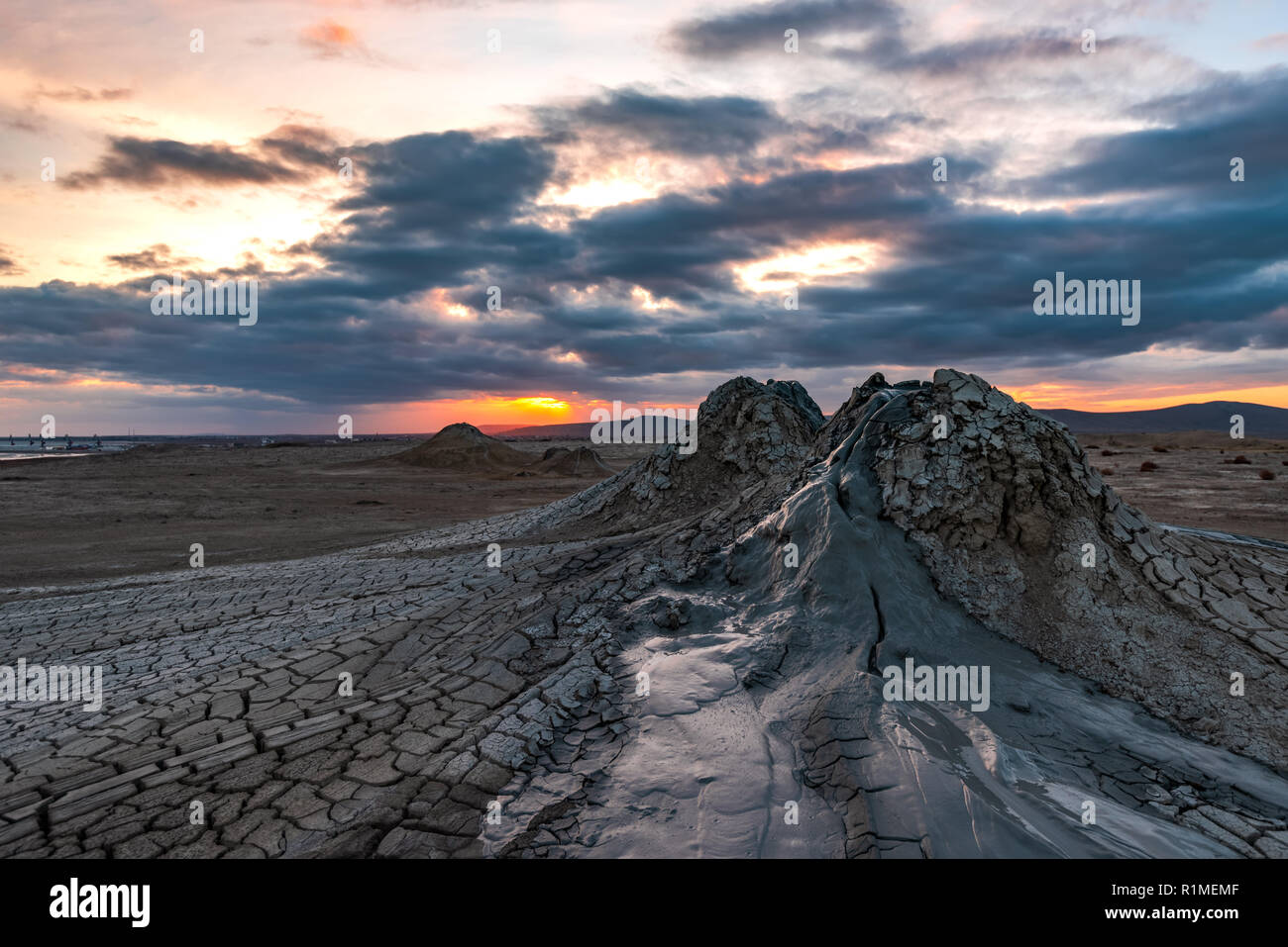 Mud volcano at sunset,  amazing natural phenomenon Stock Photo