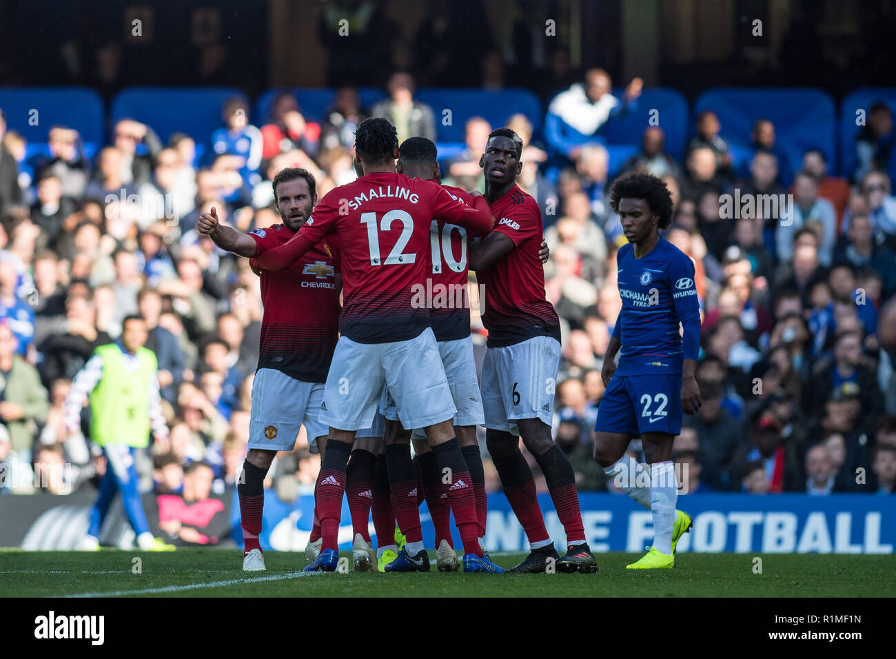 LONDON, ENGLAND - OCTOBER 20: Anthony Martial, Chris Smalling, Paul Pogba, Juan Mata of Manchester United celebrates with team mates after scoring his team's first goal during during the Premier League match between Chelsea FC and Manchester United at Stamford Bridge on October 20, 2018 in London, United Kingdom. (MB Media) Stock Photo