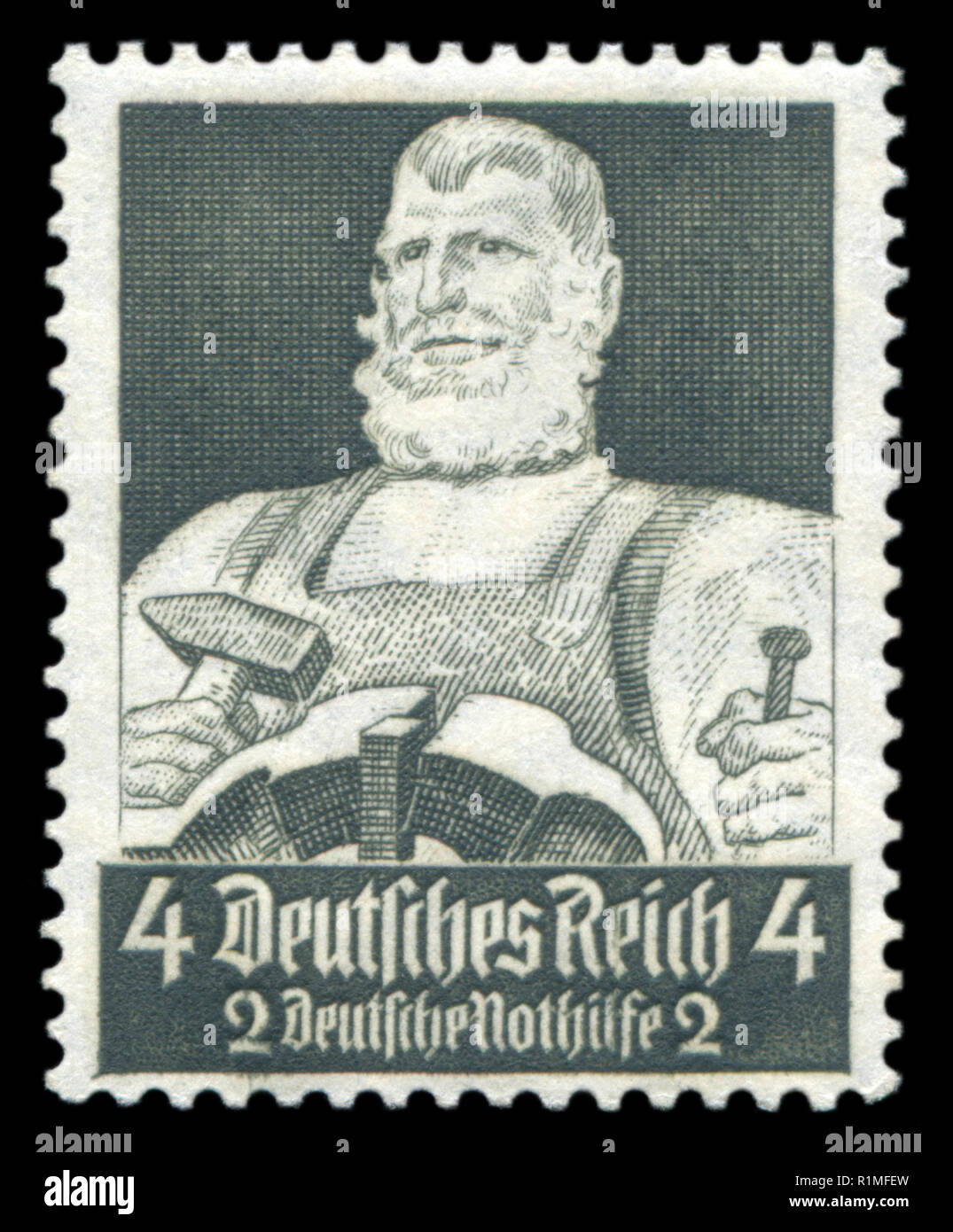 German postage stamp: Blacksmith with hammer and anvil, Emergency assistance Fund. Honourable professions, 1934, Germany, the Third Reich Stock Photo