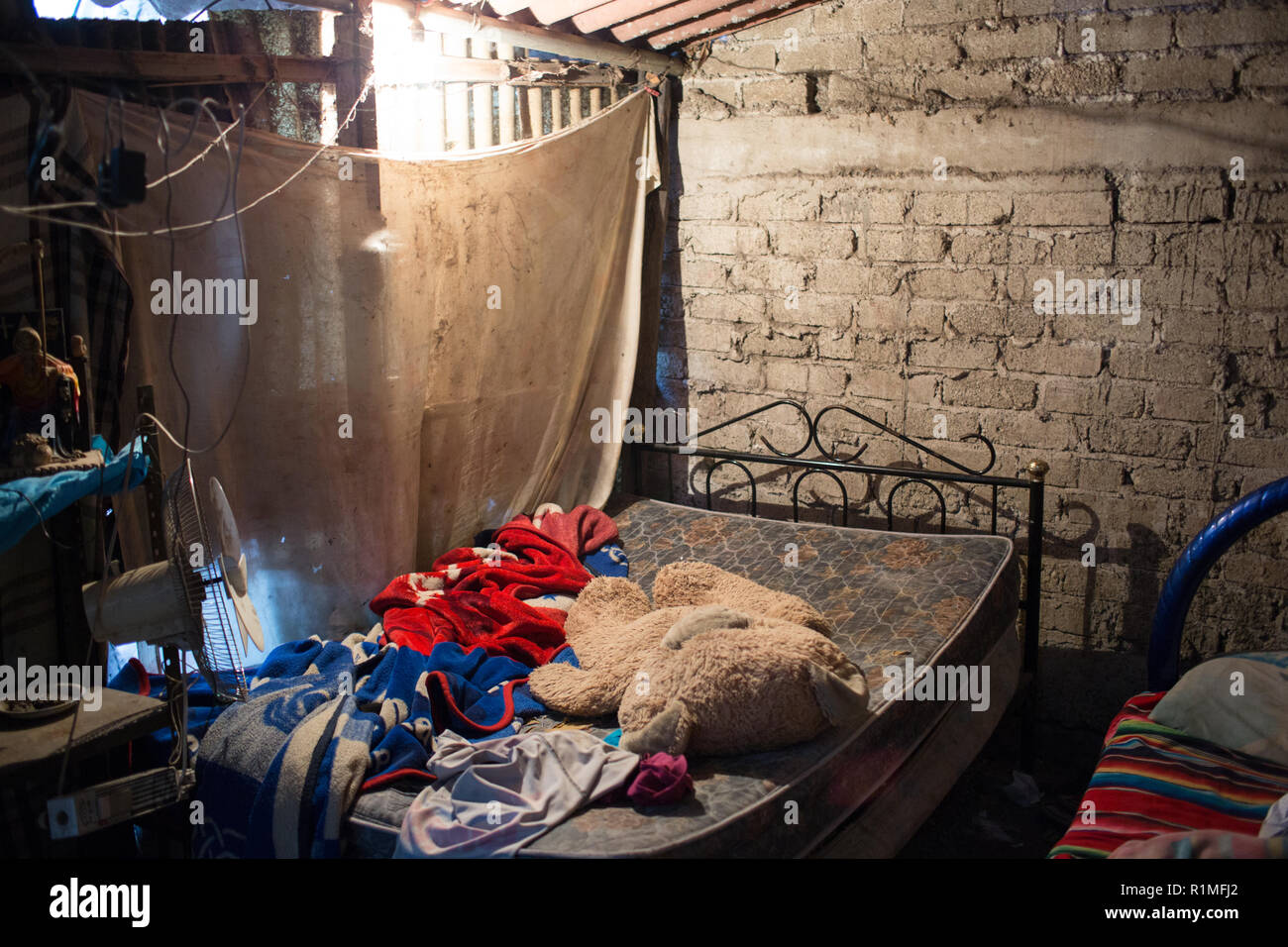 The bedroom of Antonio Ivan Contreras Mata, in Iguala, Guerrero, Mexico, February 6, 2016. Contreras Mata went went missing in Iguala October 3, 2012 from the area. He was 28 years old.   A few days prior to Antonio Ivan's disappearance he received a phone call inviting him to work with an organized crime group. Antonio said that he had three children and did not want to be involved in this life style.  His father  can not be certain, but he thinks this is possibly what created problems for his son. Stock Photo