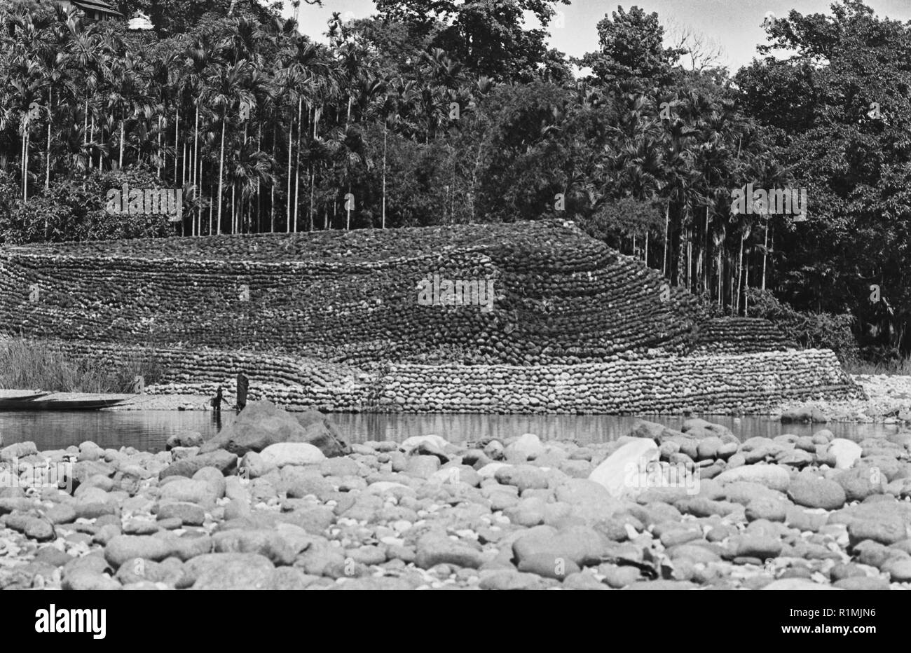Embankment on Indian side of border, Jaflong to divert water flow from Bangladesh side. 1980 Stock Photo