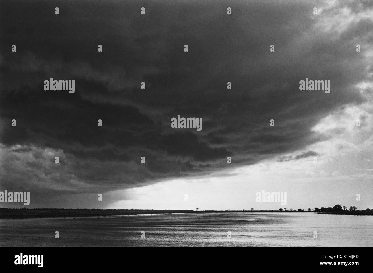 Monsoon clouds Derai River, Sylhet District 1980 Stock Photo