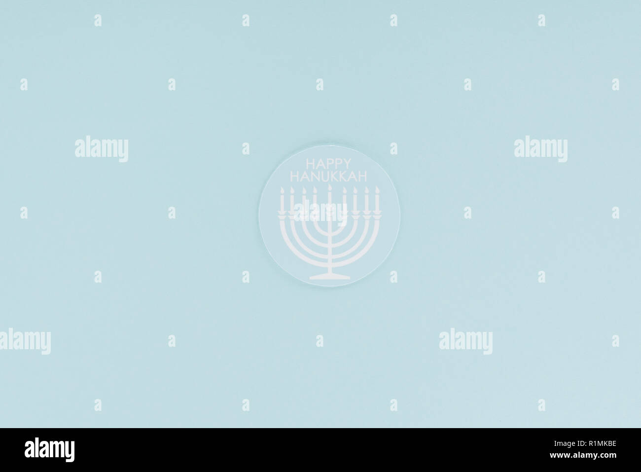 top view of happy hannukah card isolated on blue, hannukah concept Stock Photo