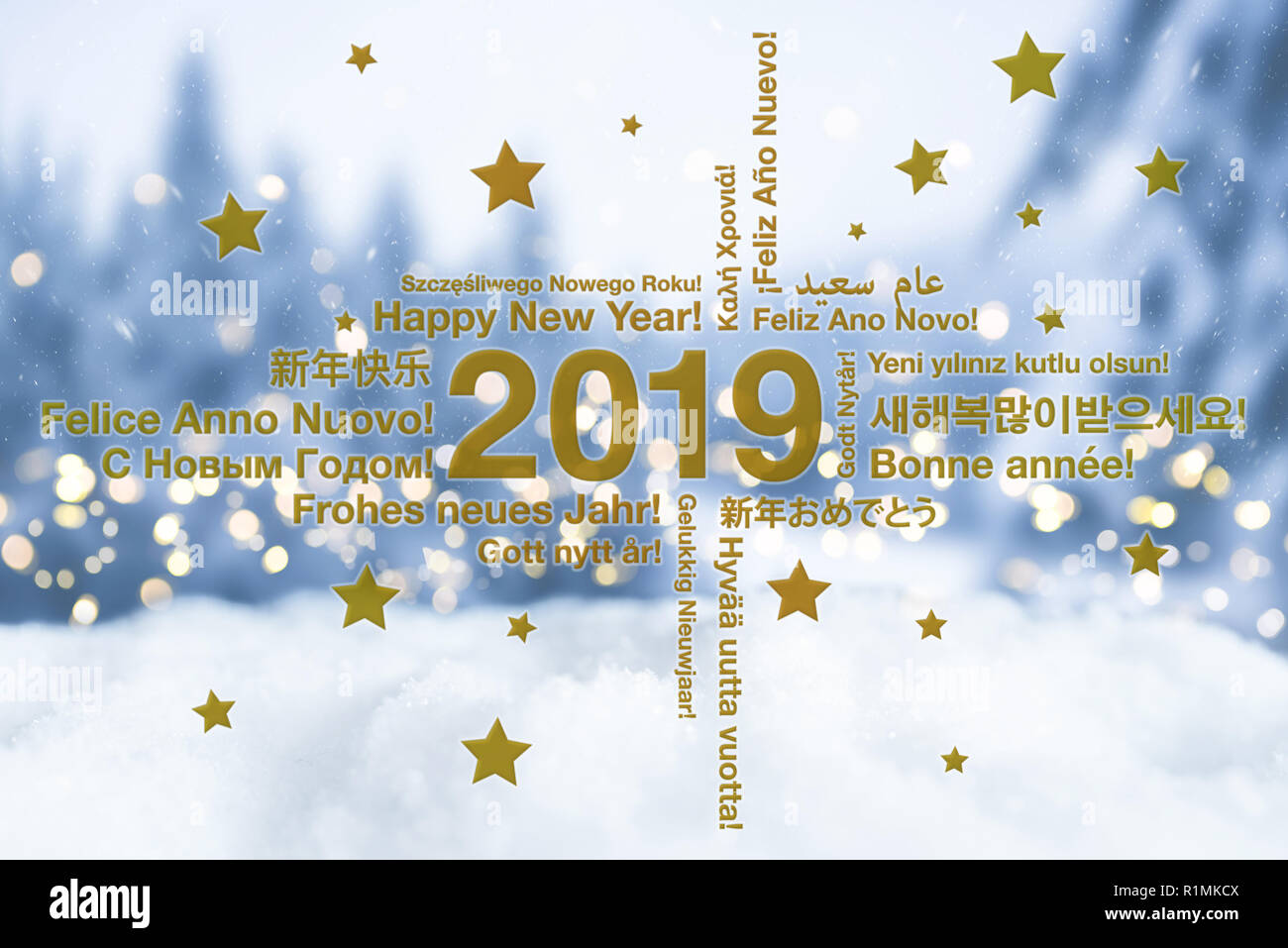 Happy New Year in different languages greeting card with snowy winter landscape in blured background Stock Photo