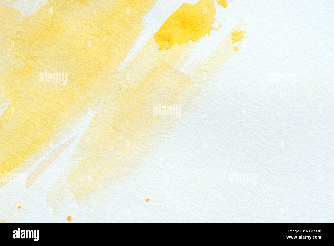 abstract yellow watercolor strokes on white paper Stock Photo - Alamy