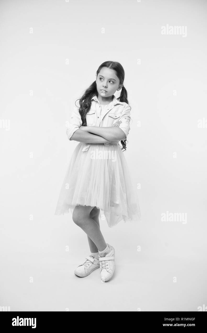 Please, pretty please.....Full length studio portrait of an adorable little  girl in a sweet pose. Stock Photo by YuriArcursPeopleimages