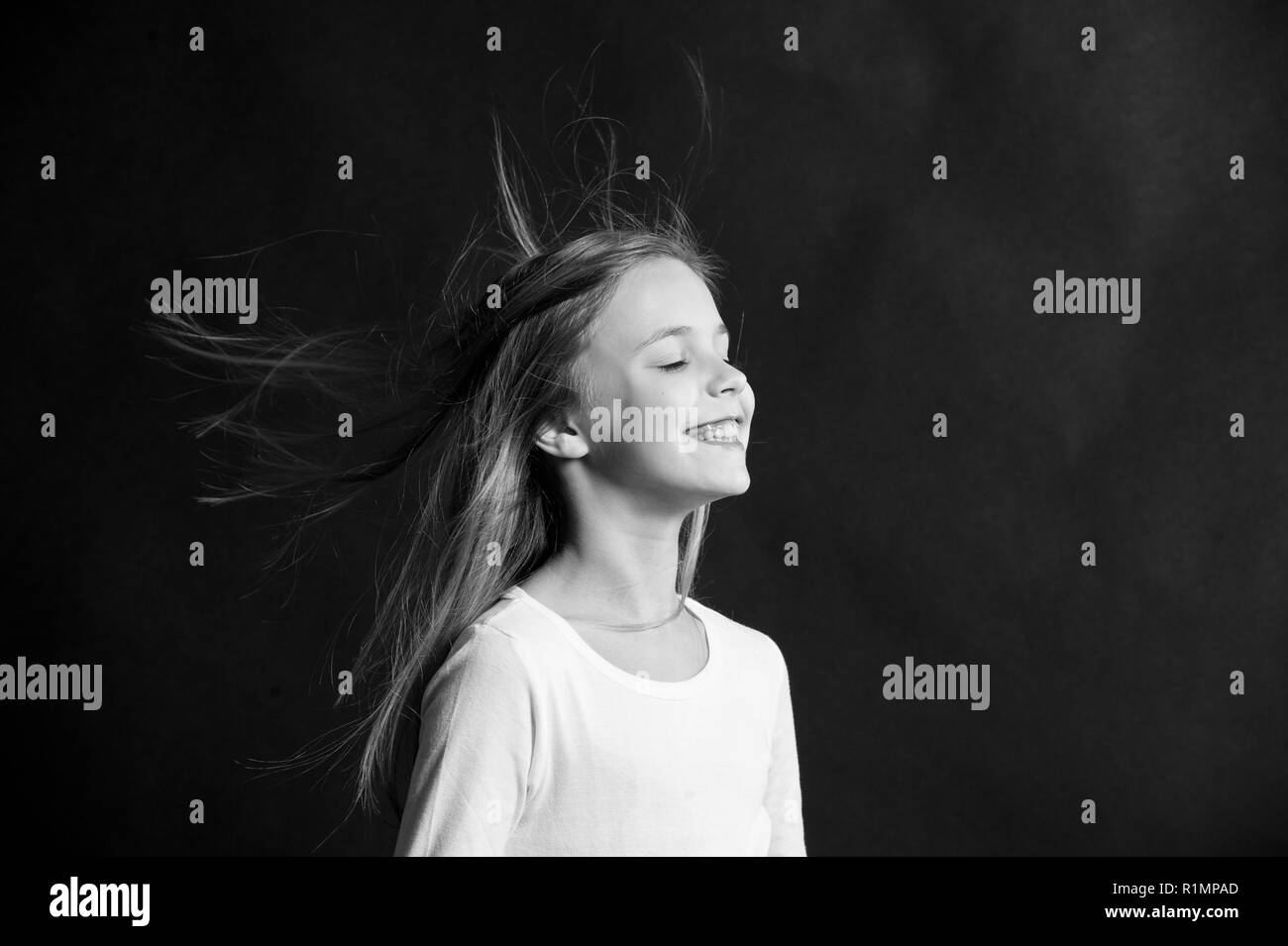 Natural Hair Girl Kid Long Hair Flying In Air Black Background