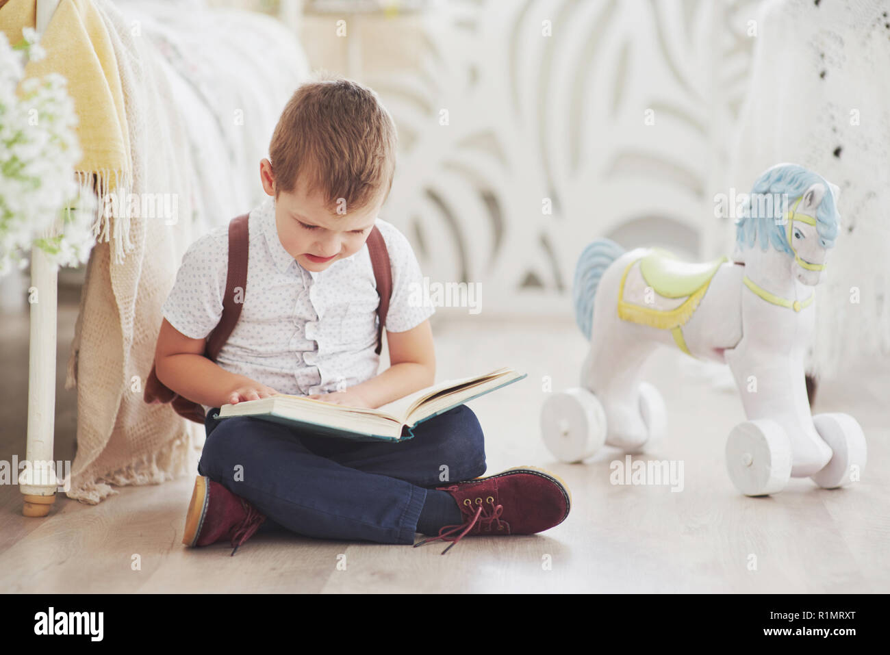 Cute little boy is going to school for the first time. Child with