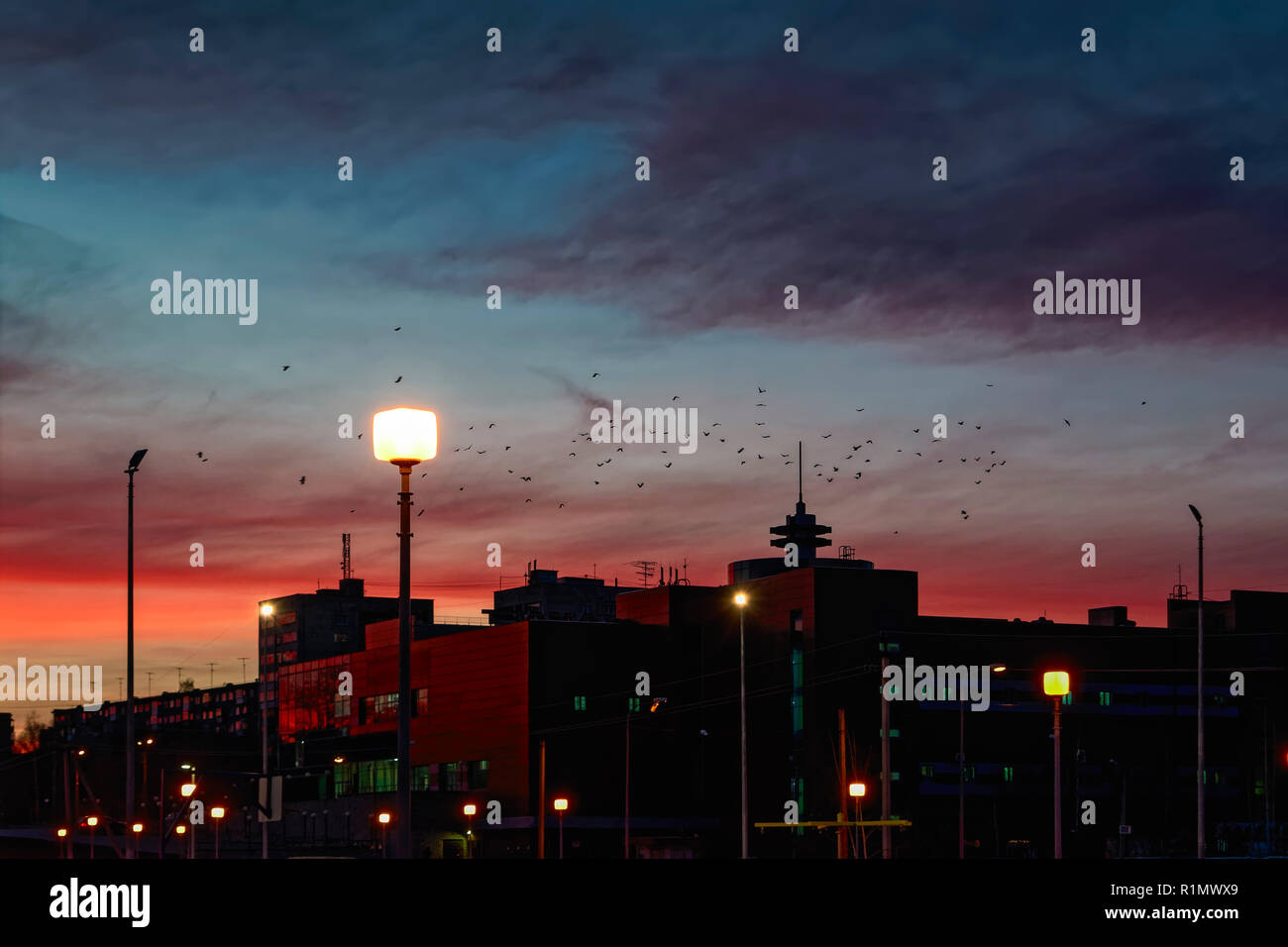 The sky with dark clouds illuminated by the setting sun Stock Photo - Alamy