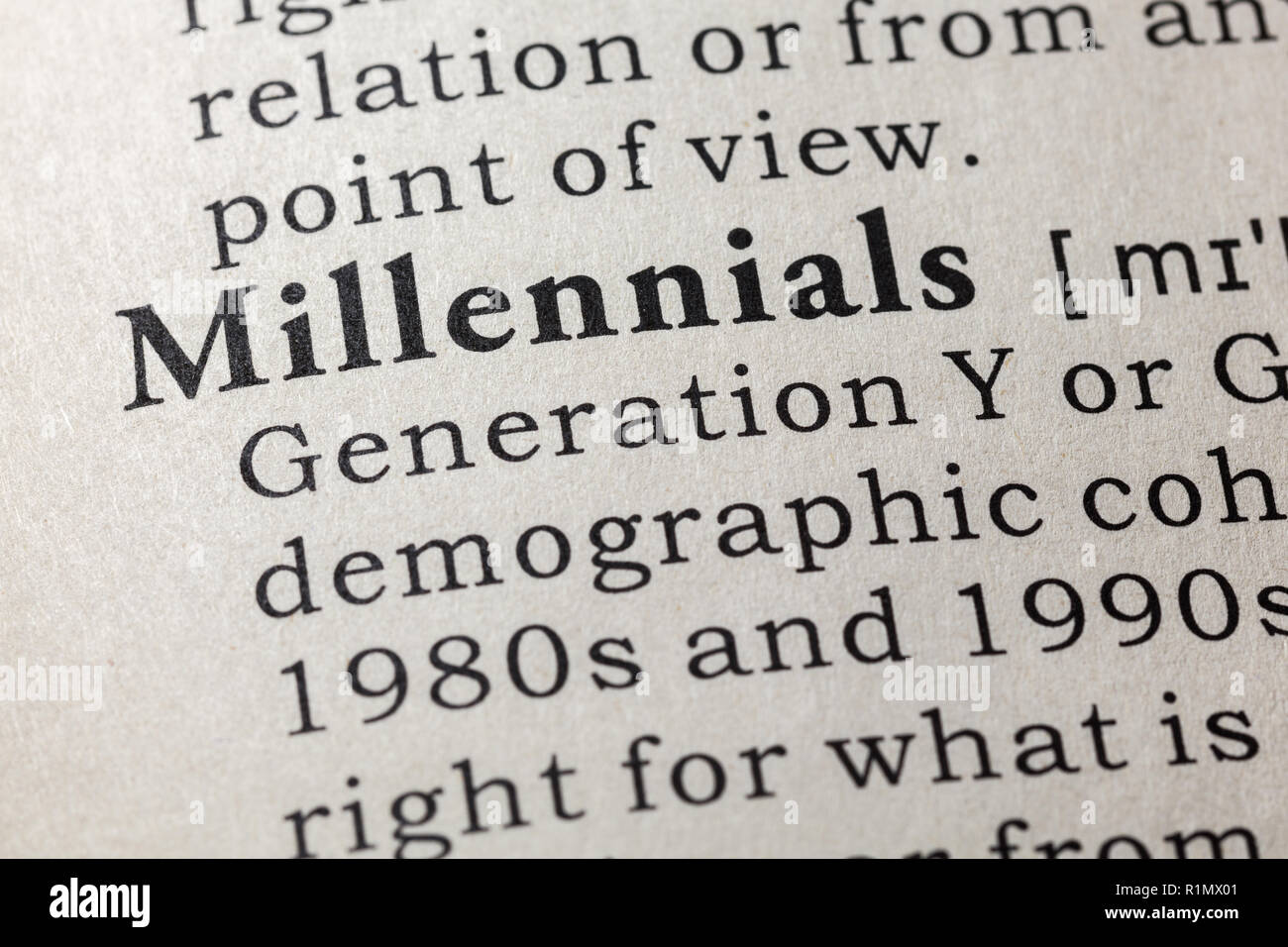 Fake Dictionary, Dictionary definition of the word millennials . including key descriptive words. Stock Photo