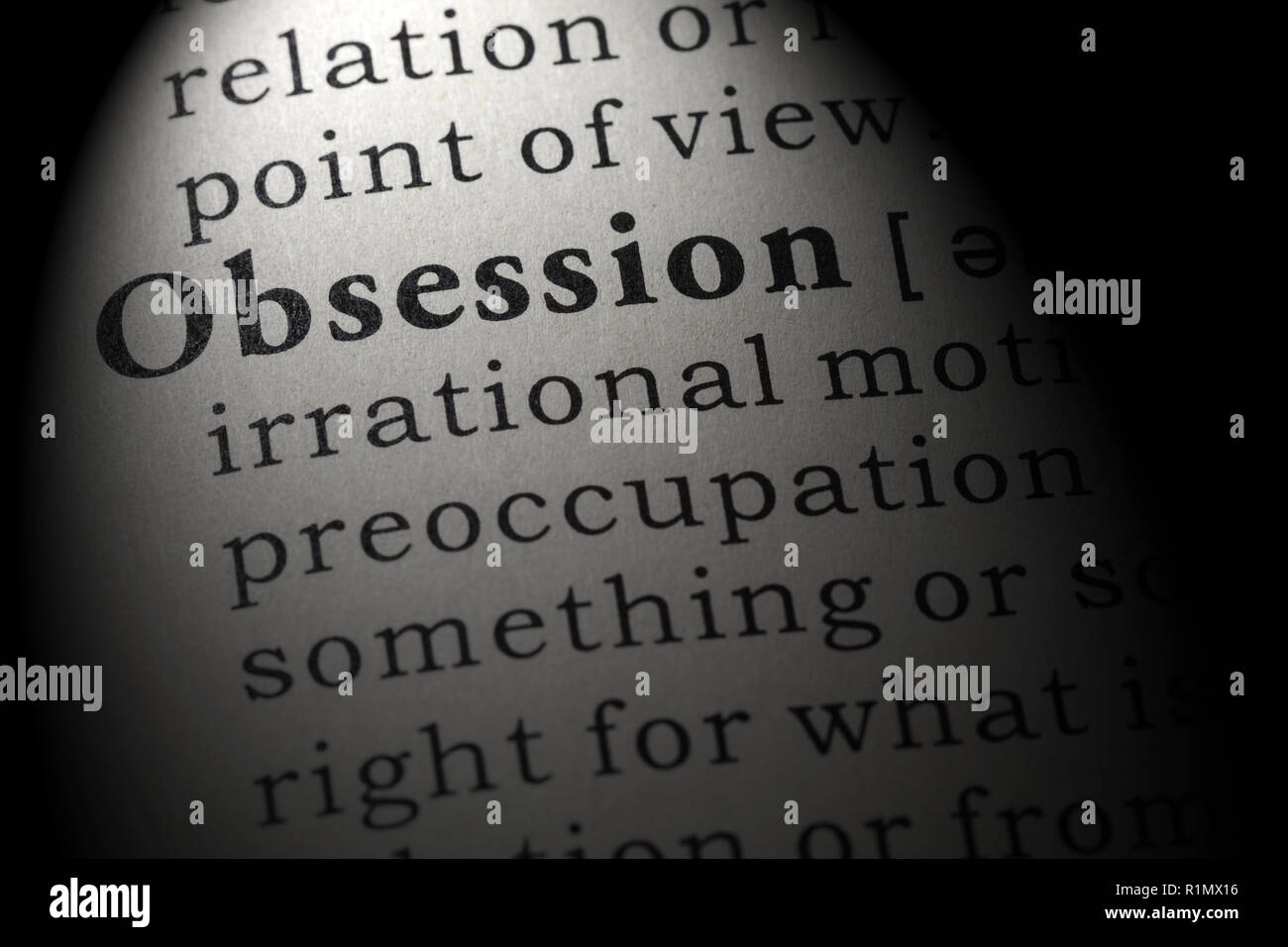 Fake Dictionary, Dictionary definition of the word obsession . including key descriptive words. Stock Photo
