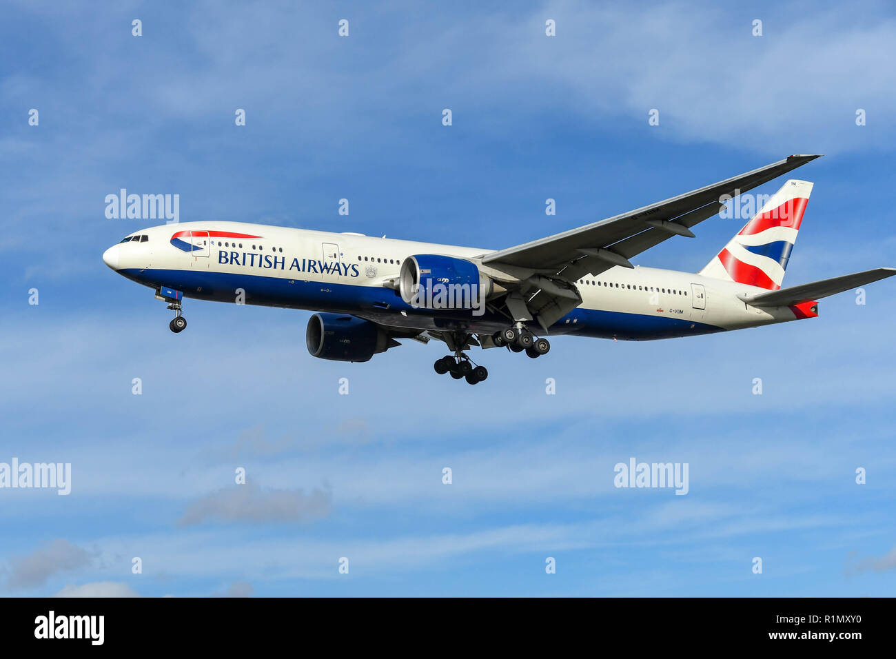 LONDON, ENGLAND - NOVEMBER 2018: British Airways Boeing 777 long haul airliner on final approach to land at London Heathrow Airport. Stock Photo