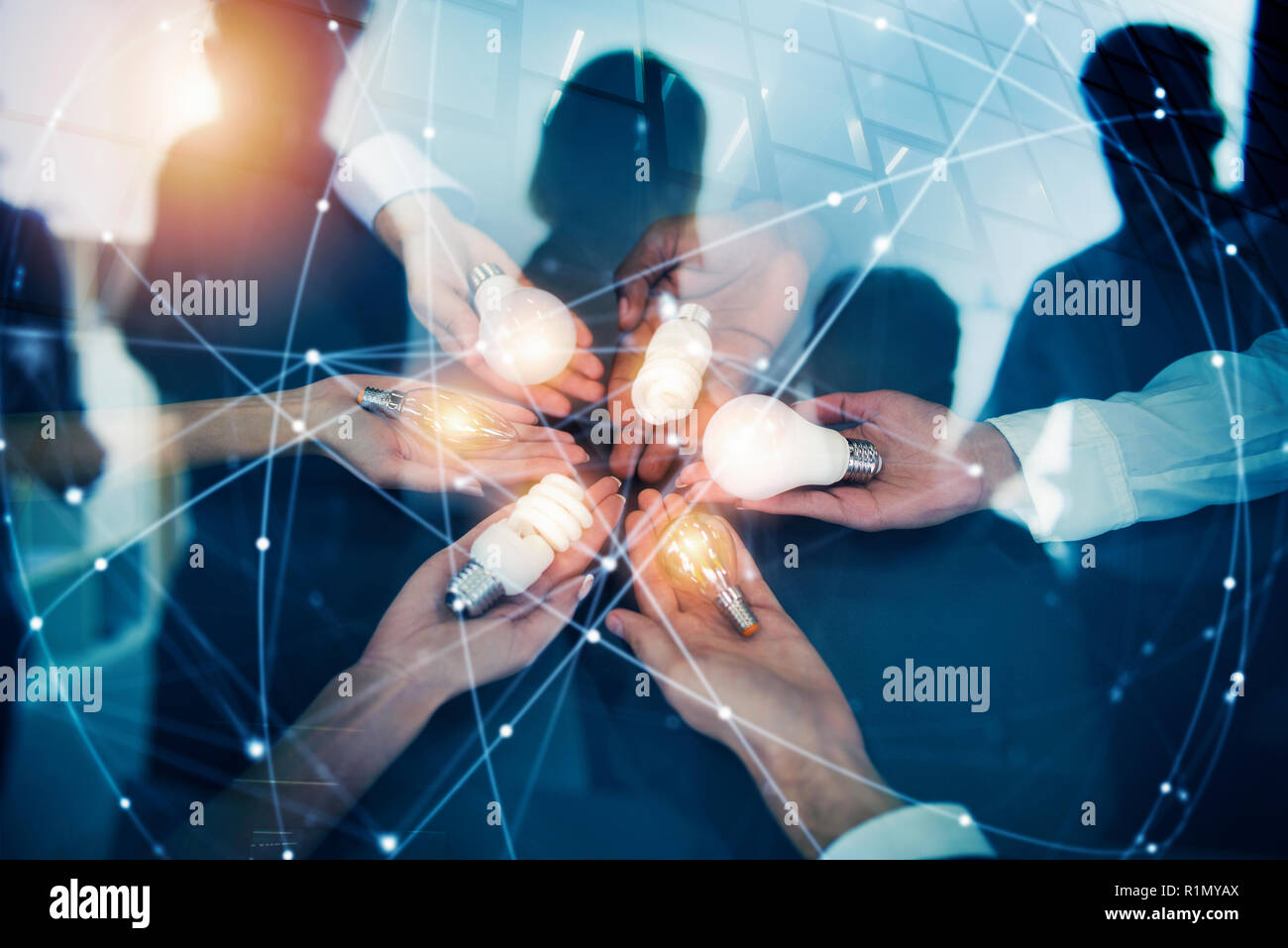 Teamwork and brainstorming concept with businessmen that share an idea ...