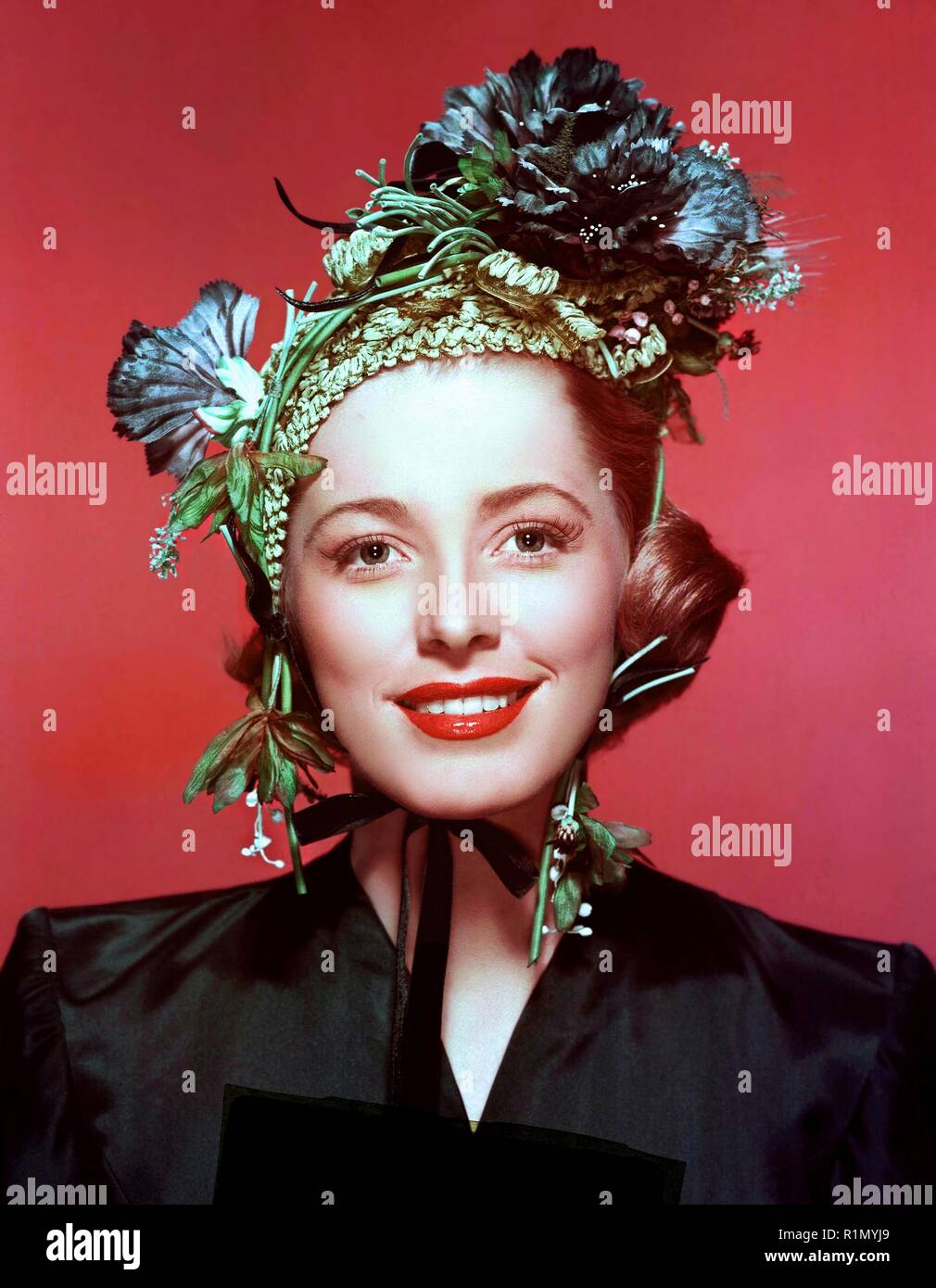 Eleanor Jean Parker (June 26, 1922 – December 9, 2013) was an American actress who appeared in some 80 movies and television series. An actress of notable versatility, she was called Woman of a Thousand Faces by Doug McClelland, author of a biography of Parker by the same title.[citation needed]  At age 18, Parker was signed by Warner Brothers in 1941. She was nominated three times for the Academy Award for Best Actress in the 1950s, for Caged (1950), Detective Story (1951) and Interrupted Melody (1955).Her role in Caged also won her the Volpi Cup for Best Actress at the Venice Film Festival O Stock Photo