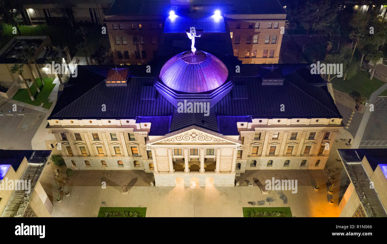 Blue light illuminates the roof in this aerial perspective of the Arizona Capitol building in Phoenix USA Stock Photo