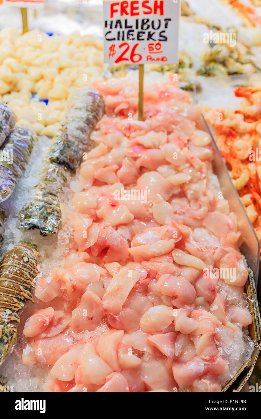 Fresh halibut cheeks on ice for sale at Pike Place Market in Seattle
