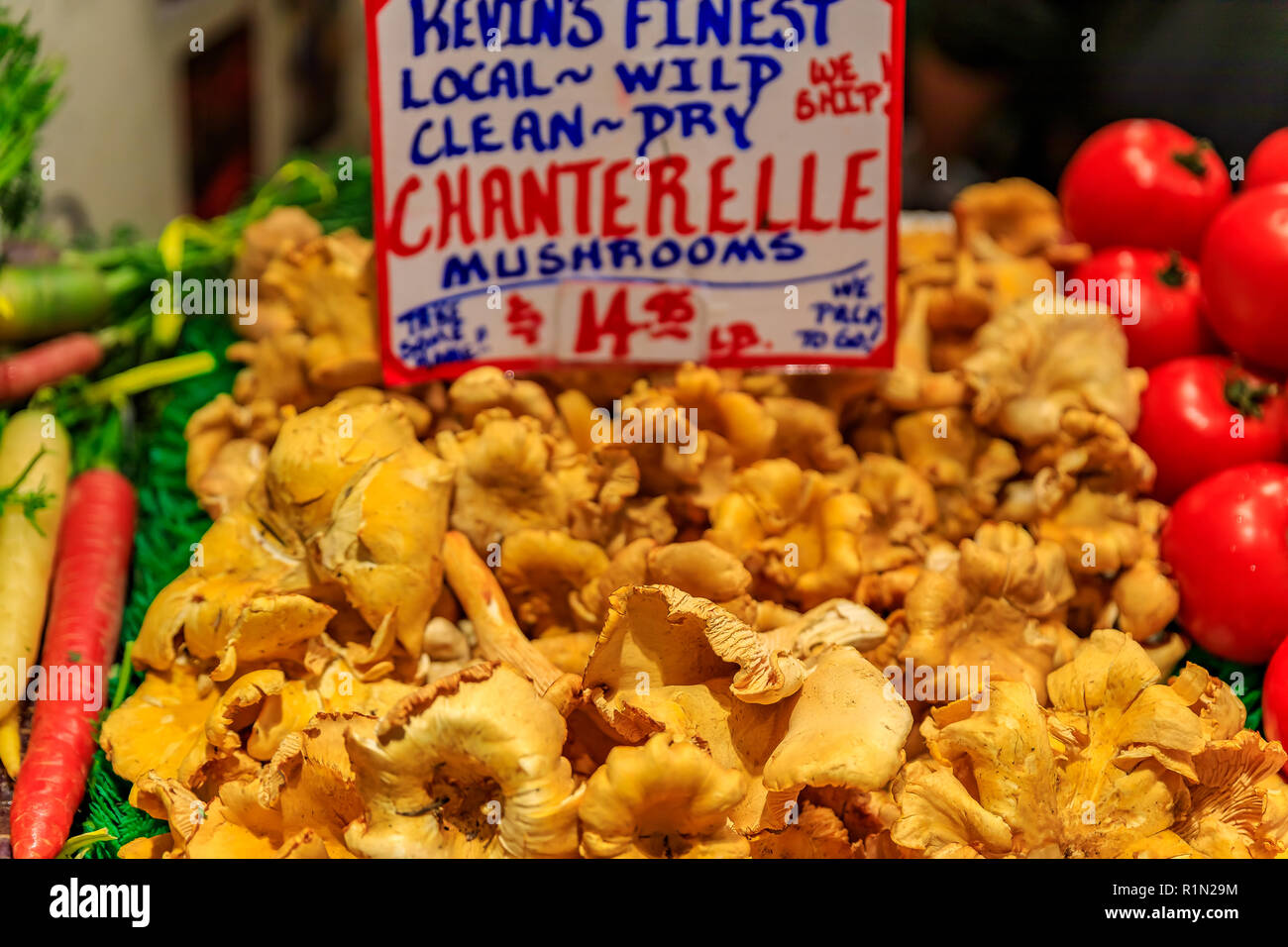 Fresh wild chanterelle mushrooms for sale at Pike Place Market in