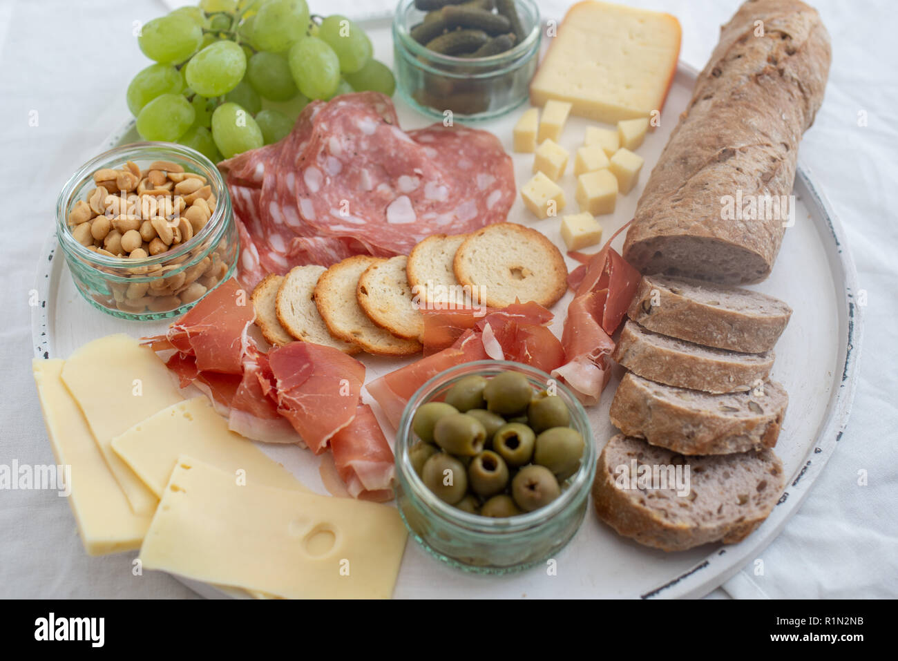 Chesse platter with cheese, prosciutto Stock Photo Alamy
