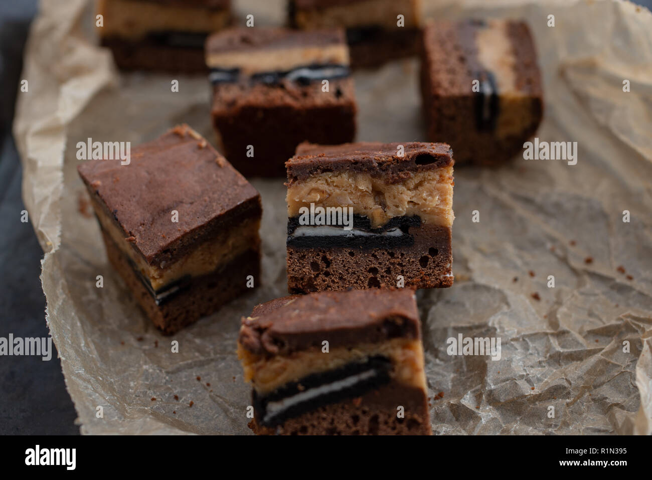 home made chocolate peanut butter brownies with cookies and cream Stock Photo