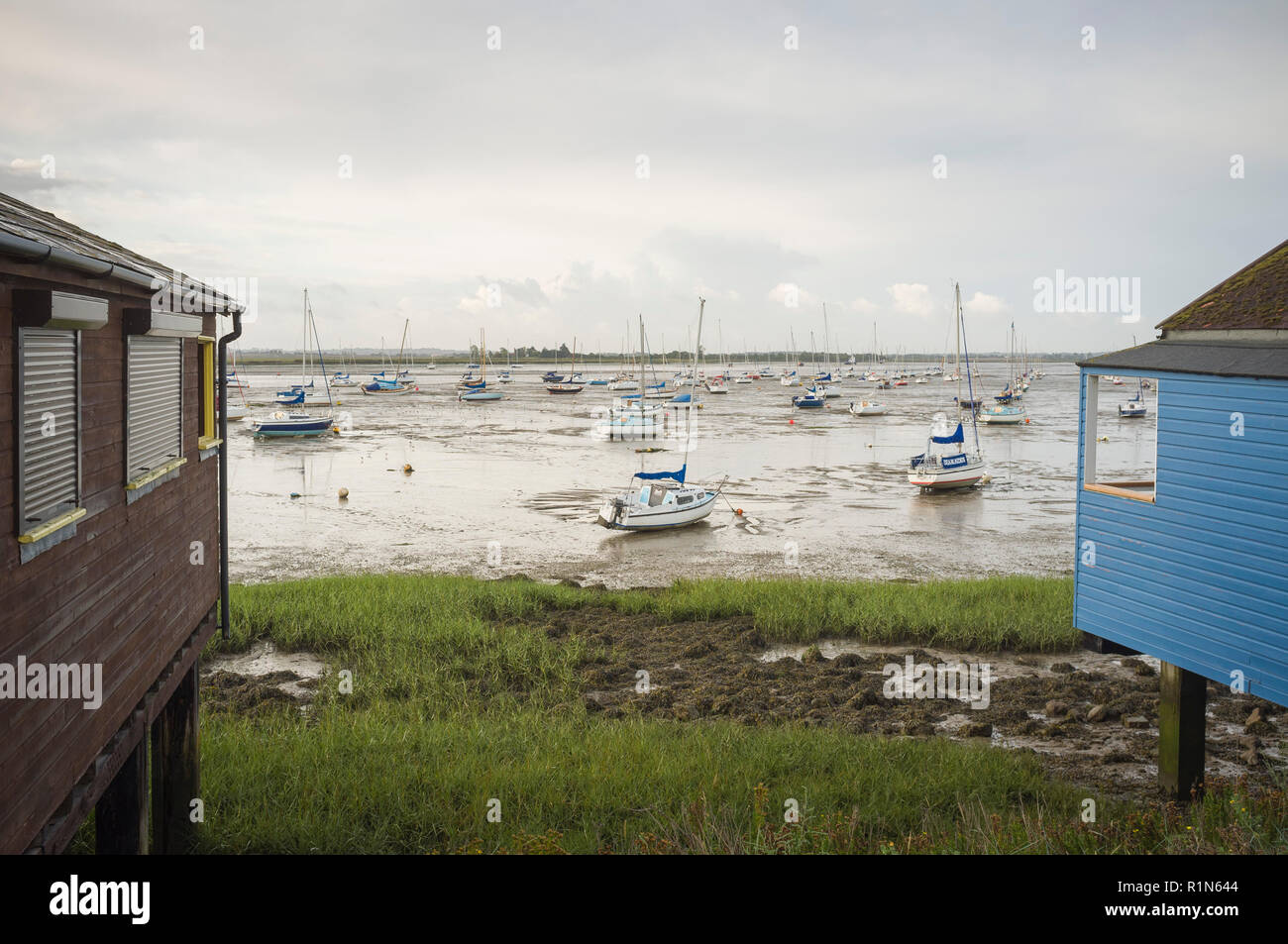 View to Osea Island and the estuary of the River Blackwater, Maldon, Essex with yachts at low tide Stock Photo