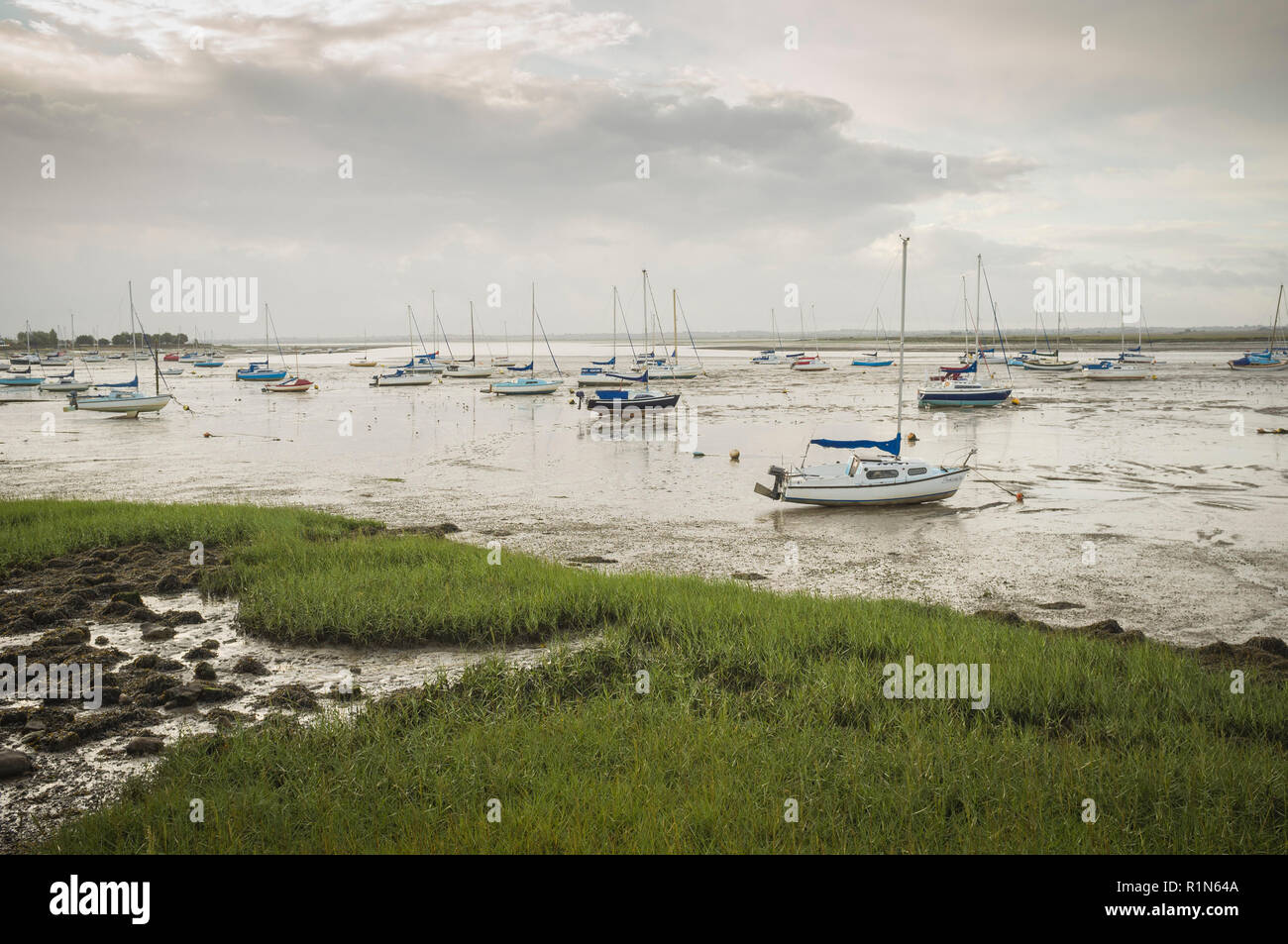 View to Osea Island and the estuary of the River Blackwater, Maldon, Essex with yachts at low tide Stock Photo