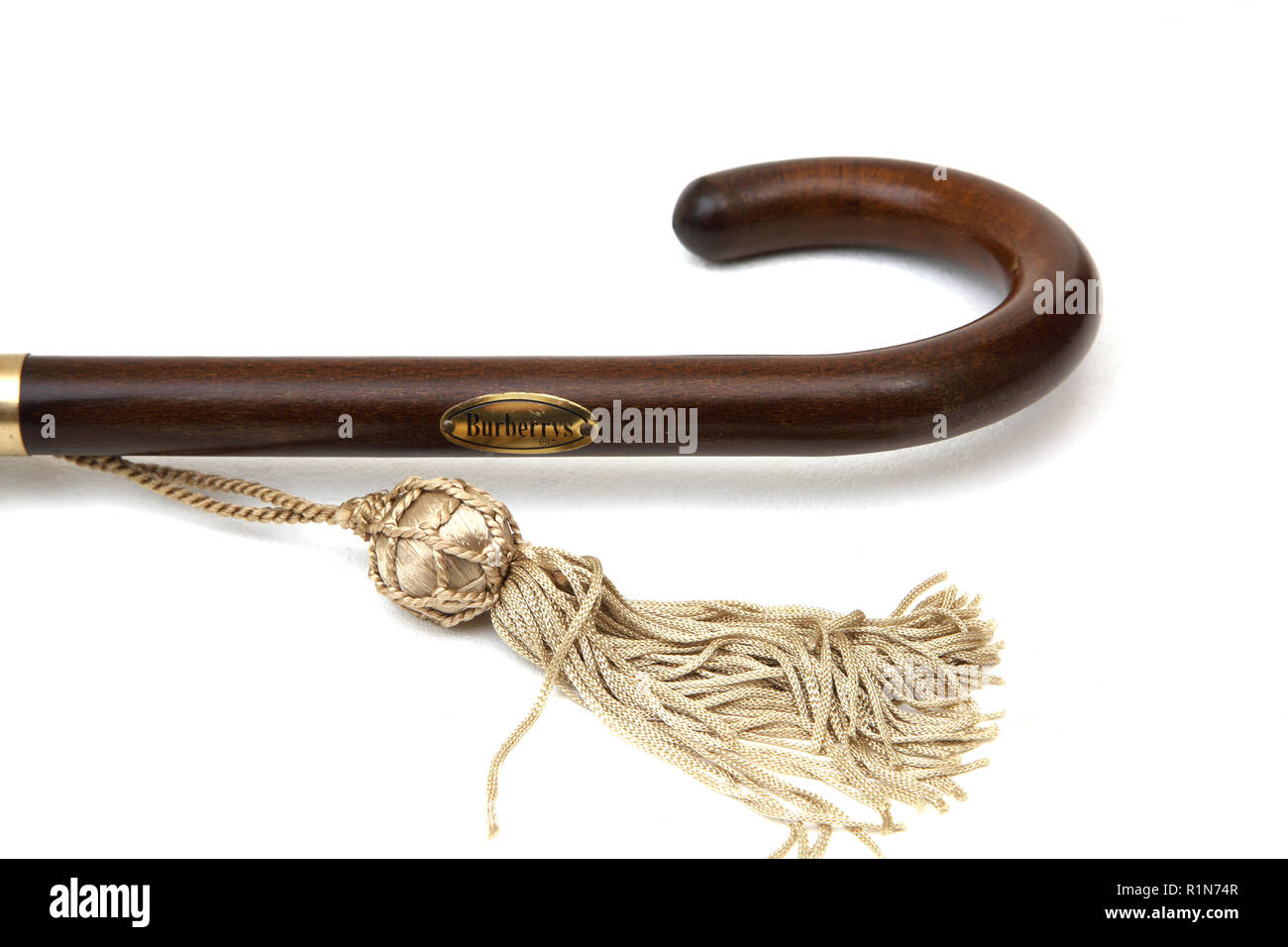 Wooden Handle and Tassel of Burberry's Umbrella Stock Photo - Alamy