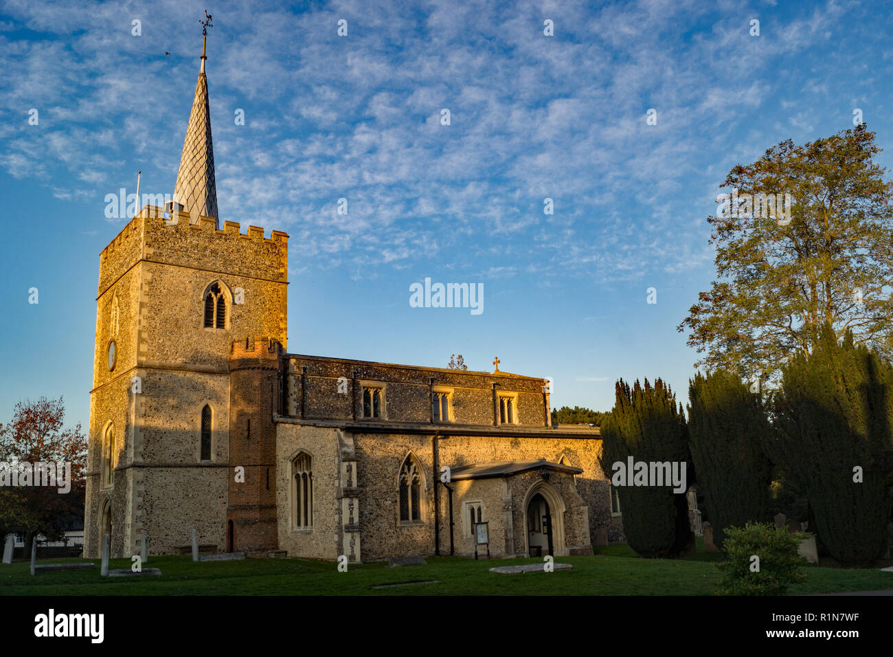 St Mary,s C of E church in Sawbridgeworth in the evening light in late summer under a nearly clear blue sky, a most tranquil evening. Stock Photo