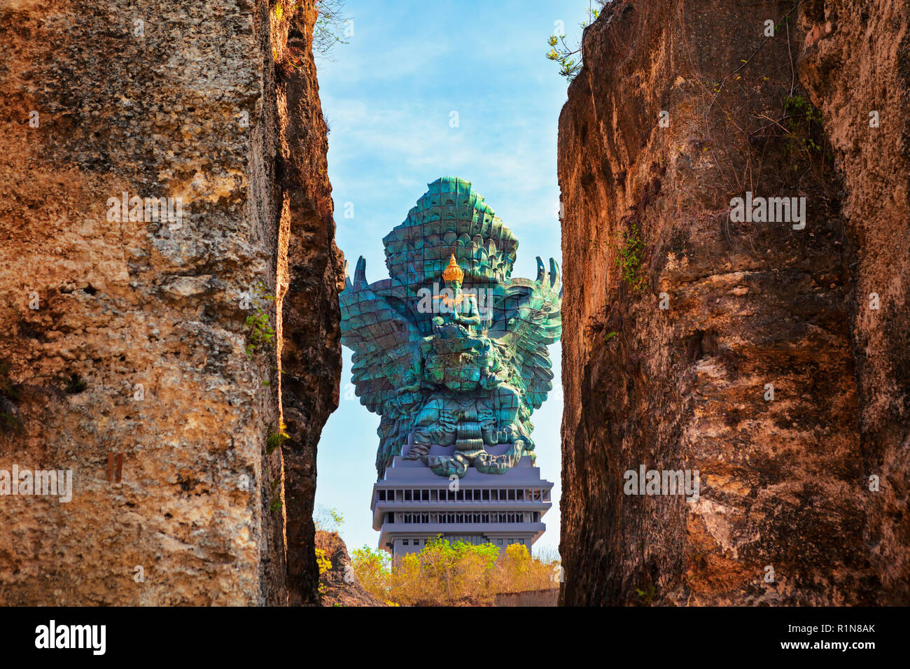 Landscape picture of largest Garuda Wisnu Kencana GWK statue as  Bali landmark with blue sky as a background. Stock Photo