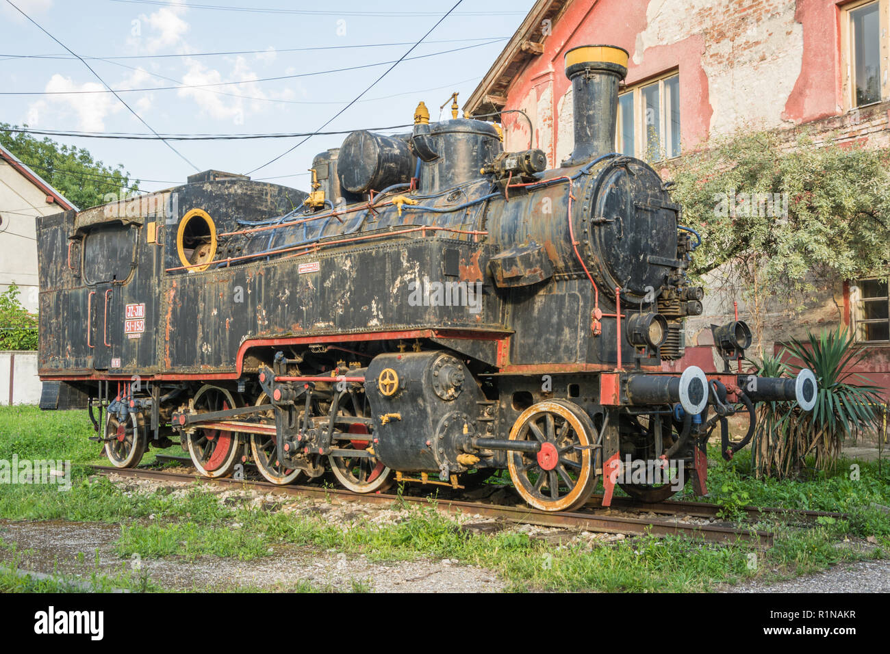 Old Yugoslavian train near old rail station in city of Vrsac Serbia East Europe Stock Photo