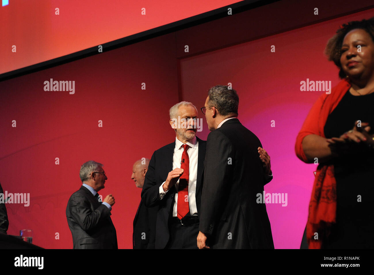 Liverpool, England. 26th September, 2018.  Jeremy Corbyn MP, leader of the Labour Party, talks to his deputy, Tom Watson at the close of conference, o Stock Photo