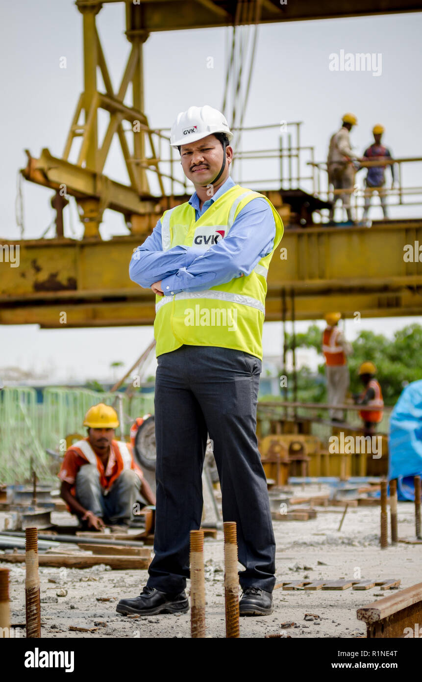 Portrait of a safety officer on the field at a construction site. Stock Photo