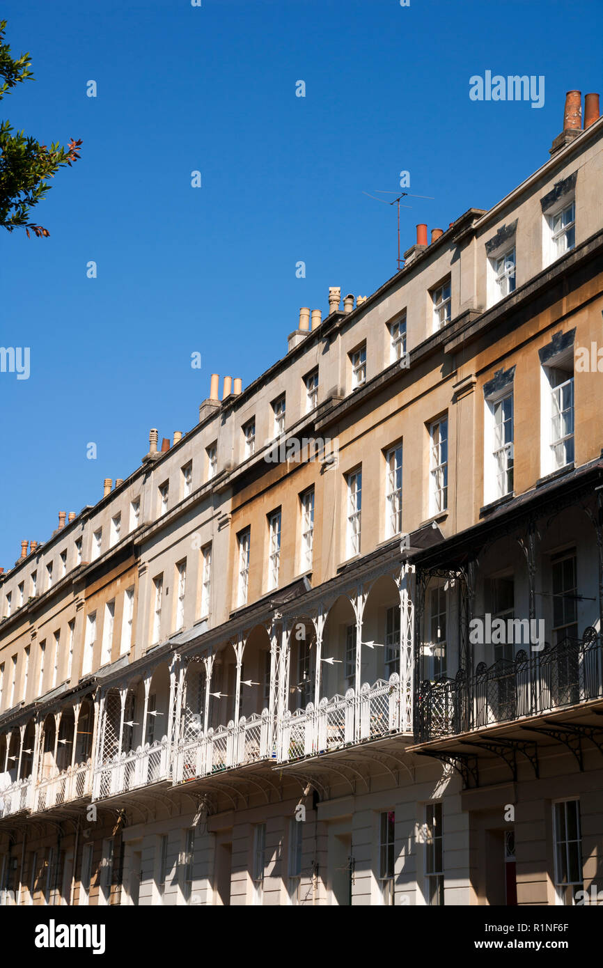 Ornate canopied balconies on historic terraced houses in Caledonia