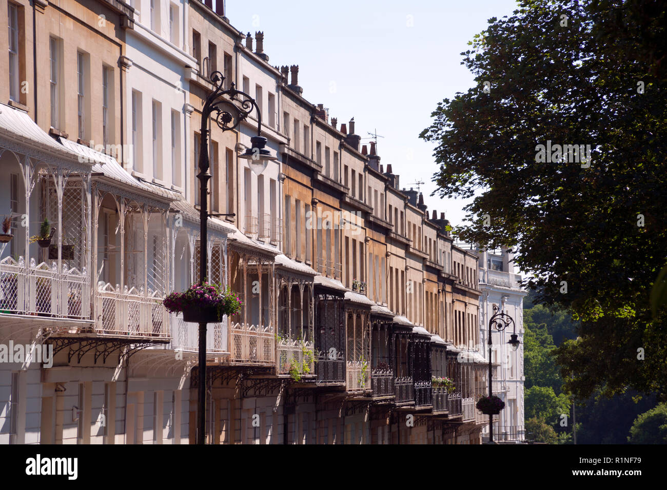 Ornate canopied balconies on historic terraced houses in Caledonia