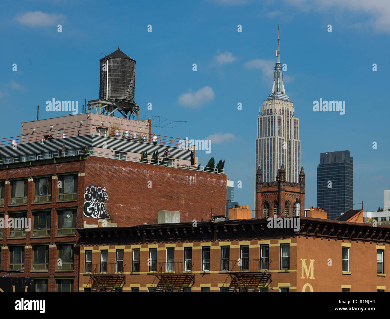Buildings with Empire State Building in the background, Midtown Manhattan, New York City, New York State, USA Stock Photo