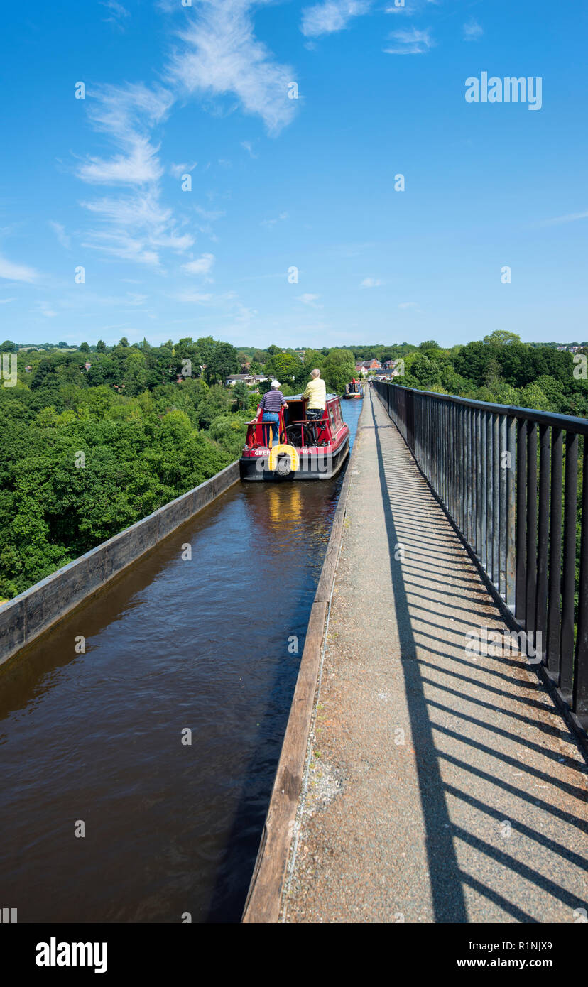 Narrow boat on the Pontcysyllte Aqueduct, which carries the Llangollen Canal across the River Dee in north east Wales in the UK Stock Photo