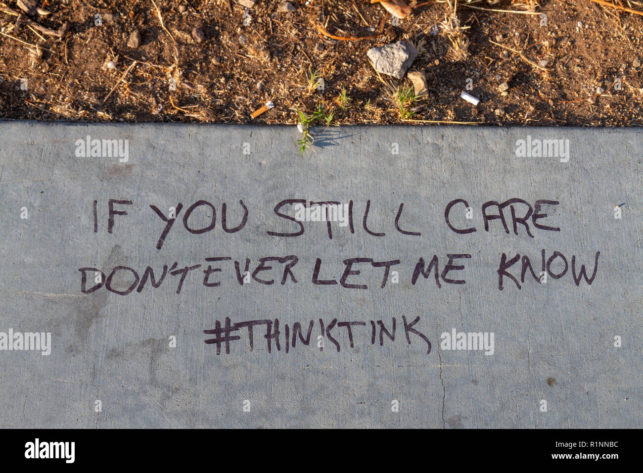 Slipknot quote "If you still care don't ever let me know. Thinktink", downtown San Diego