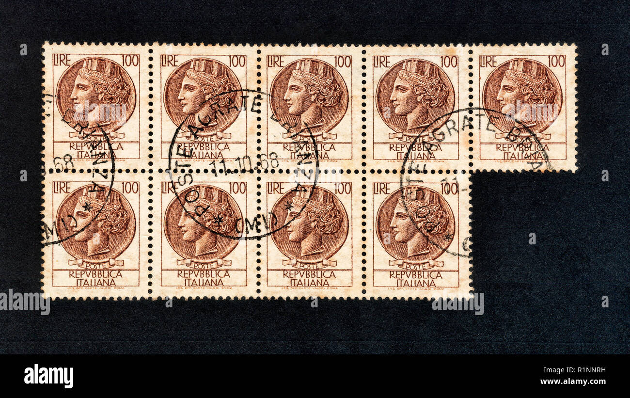 Italy - CIRCA 1968: A stamp printed in Italy, shows in up corner the value of a postage stamp and in the center image of a woman head with turreted cr Stock Photo