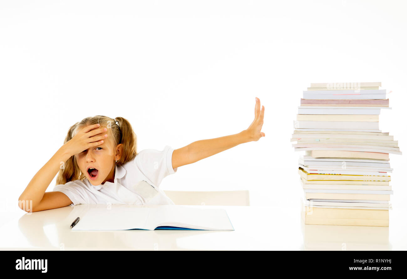 Frustrated little schoolgirl feeling a failure unable to concentrate in reading and writing difficulties learning problem attentional disorders specia Stock Photo