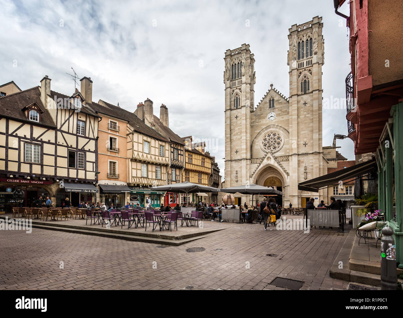 St Vincents Cathedral and cafe culture in Place St Vincent, Chalon sur Saone, Burgundy, France on 16 April 2016 Stock Photo