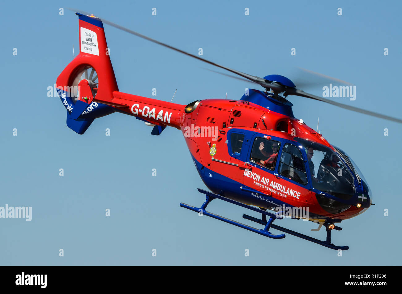Devon Air Ambulance Eurocopter EC135 G-DAAN flying. Helimed emergency helicopter Stock Photo