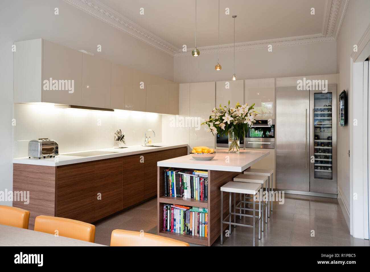 Modern kitchen with flower arrangement Stock Photo