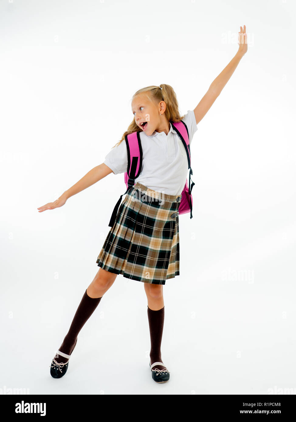 Adorable beautiful little schoolgirl with big pink schoolbag feeling ...